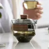 Modern Glass Tea Ware with Wooden Handle Design for Tea Lovers