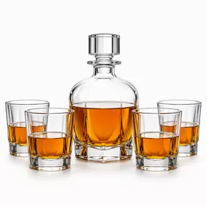 Rounded whiskey decanter set with four old fashioned whiskey glasses