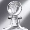 Decorative whiskey decanter with elegant globe shaped glass stopper