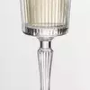 Vertical ribbed champagne glass with tall bowl for sparkling wine serving