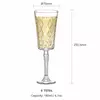 Faceted stem champagne glass with geometric detailing and circular foot