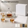 Decorative round whiskey serving set with decanter and four matching glasses