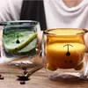 Transparent double wall glass mug featuring bear illustration