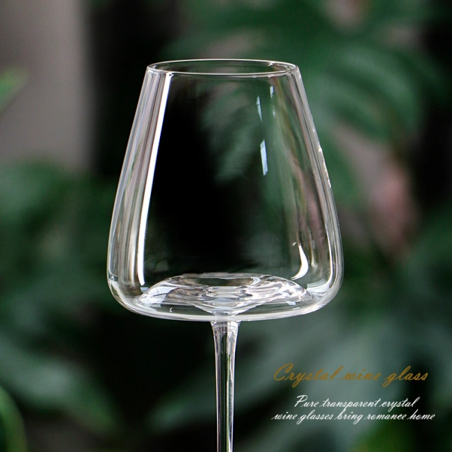 Jiateng high-transparency crystal wine glasses displayed on a clean table with greenery backdrop, perfect for home entertaining or fine dining.