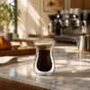 100ml transparent double wall espresso coffee cup with flared rim and curved waist for wholesale glassware buyers and coffee shops