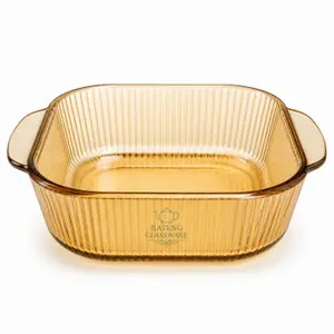 2.4L amber square borosilicate glass baking dish with vertical fluted texture and integrated side handles for oven cooking.