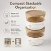 Large 650ml round food storage container measuring 11.5 by 11.5 by 7.6cm with removable inner tray and stackable design