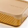 1800ml horizontal glass food storage container measuring 22.4 by 16.1 by 7.6cm with transparent amber glass body and beige lid