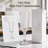 Decorative stemmed drinking glass with vertical fluted style body