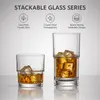Short clear whiskey glass with ice for whiskey and spirits presentation