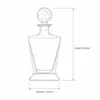 Football themed whiskey bottle with clear glass body and decorative stopper