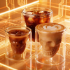 A stylish Jiateng transparent glass tumbler with a 3D skull design, perfect for serving bourbon or scotch on the rocks.