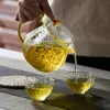 Luxury transparent glass teapot set with gold handle by Jiateng
