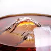 Close-up detail of Jiateng wine decanter's iceberg mountain base, showcasing intricate 3D texture and premium glass craftsmanship
