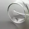A unique curvy glass cup styled as a modern cocktail tumbler for high-end barware