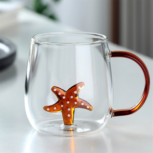 Jiateng clear glass cup with 3D starfish decoration inside, perfect for tea, coffee, or juice, stylish and fun for home or office
