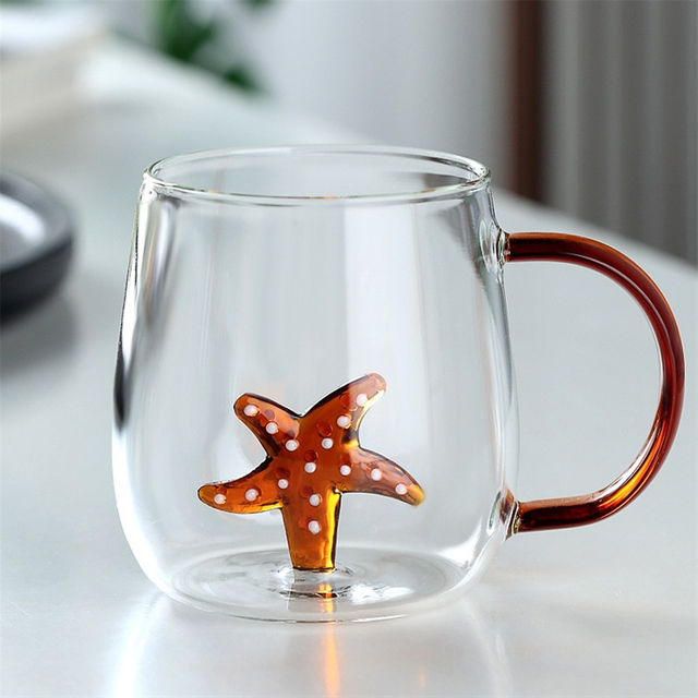 Jiateng clear glass cup with 3D starfish decoration inside, perfect for tea, coffee, or juice, stylish and fun for home or office