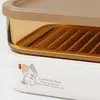 Large 1720ml stackable food storage container measuring 22.4 by 16.1 by 7.6cm with transparent amber body section and removable tray.