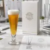 clear tapered footed beer glass for lager and beer serving