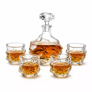 Textured whiskey decanter set with four matching rock glasses