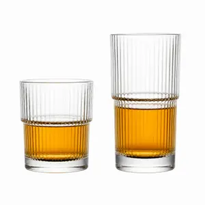Ribbed stackable drinking glass set with short tumbler and tall highball glass