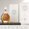 Clear round spirits decanter with elegant teardrop profile for modern home bar display