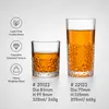 Clear short whiskey tumbler with geometric diamond pattern for spirits and ice