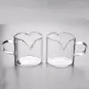 Modern transparent heart-shaped glass coffee mug with minimalist design
