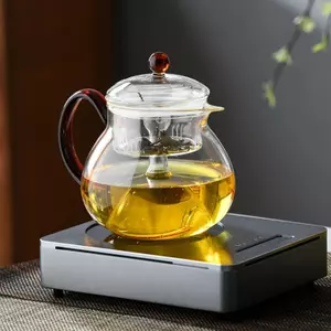 Handmade borosilicate glass teapot with built-in glass infuser for loose leaf tea brewing