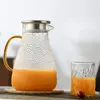 Premium textured glass water jug with stainless steel lid for serving water and fruit-infused drinks