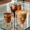 Jiateng unique skull-shaped drinking glass with condensation droplets, designed for a bold drinking experience.