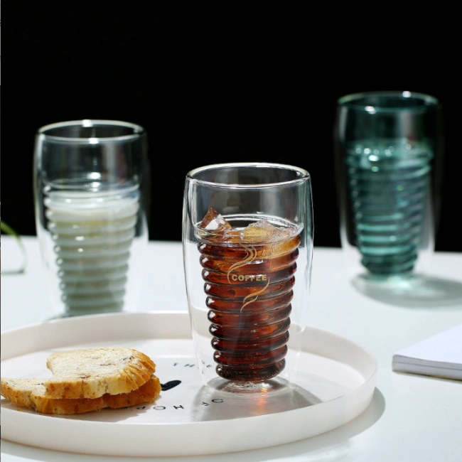 Pair of spiral double wall glass cups for coffee and juice gift set