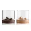 Creative mountain whiskey glass tumbler with elegant wooden base for bourbon and cocktails