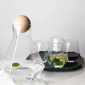 Modern iridescent glass water pitcher with wooden lid for stylish beverage serving