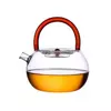Stylish borosilicate glass tea kettle with artistic colored handle design