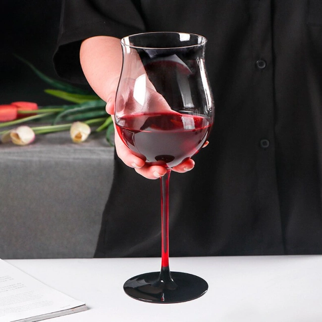 Close-up detail of Jiateng red stem wine glass, highlighting the vibrant color and premium lead-free crystal craftsmanship.