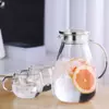  Industry-standard food-grade glass pitcher designed for safety. Features a rust-proof stainless steel lid and ergonomic handle for precise pouring and reliable daily service.