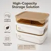 Rectangular food storage box featuring a removable inner tray with raised grid design for organizing stored food contents.