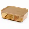 Horizontal rectangular divided food storage containers available in 1240ml and 1750ml capacities with beige lids and fixed internal dividers