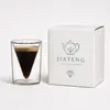 Modern cylindrical double wall coffee glass with straight outer sides and inverted cone shaped interior