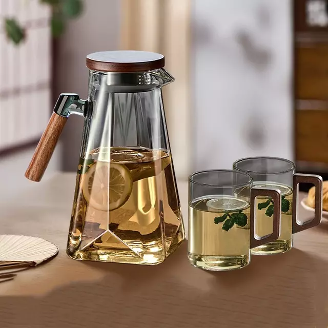 Glass water pitcher with wooden handle and filter lid for tea and fruit drinks