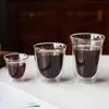 Double wall espresso glass with transparent layered construction