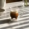 Elegant curved double wall coffee mug suitable for espresso based drinks and cafe beverage presentation