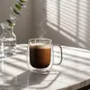 300ml rounded double wall coffee mug measuring 100mm in height and 75mm in rim diameter