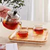 Heat-resistant square glass teapot featuring a removable stainless steel tea filter