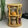 Premium glass spice jar organizer featuring airtight bamboo lids and rotating display stand