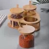 Decorative bamboo seasoning container set with glass jars for organized kitchen countertops