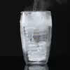 Side angle of spiral glass cup highlighting its elegant curves