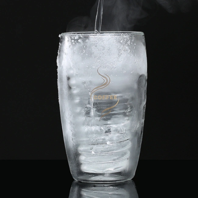 Side angle of spiral glass cup highlighting its elegant curves