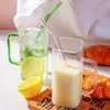 Stylish glass tumbler designed for iced beverages. Features a comfortable handle, splash-proof lid, and matching colored straw.